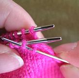 front needle - second stitch purlwise